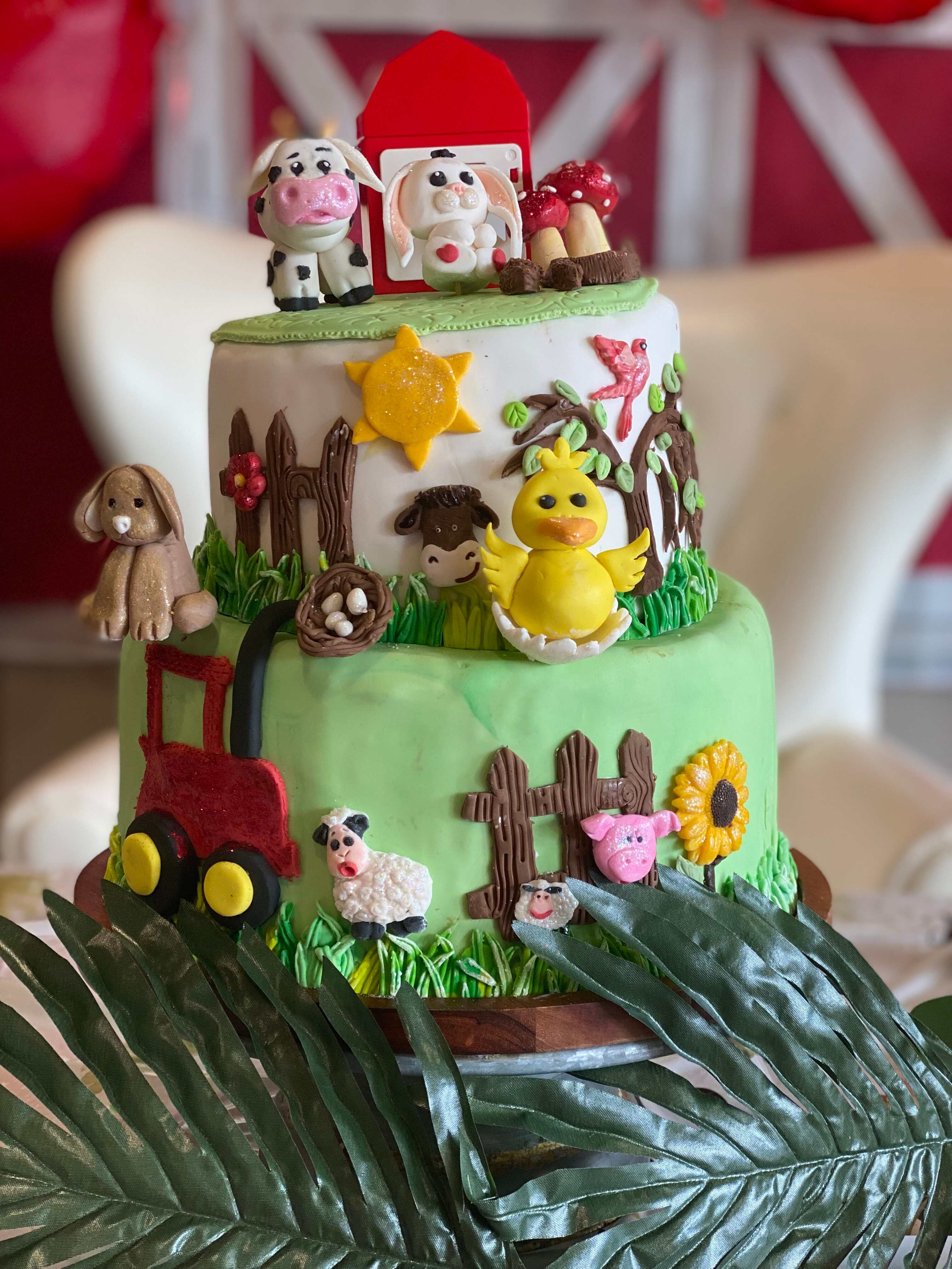 A cake decorated with farm animals and farm animals.
